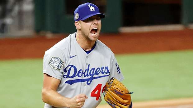 Blake Treinen celebrates after a strikeout.